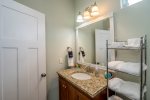 The second bedroom shares a bathroom with the third bedroom and has a tub/shower combo